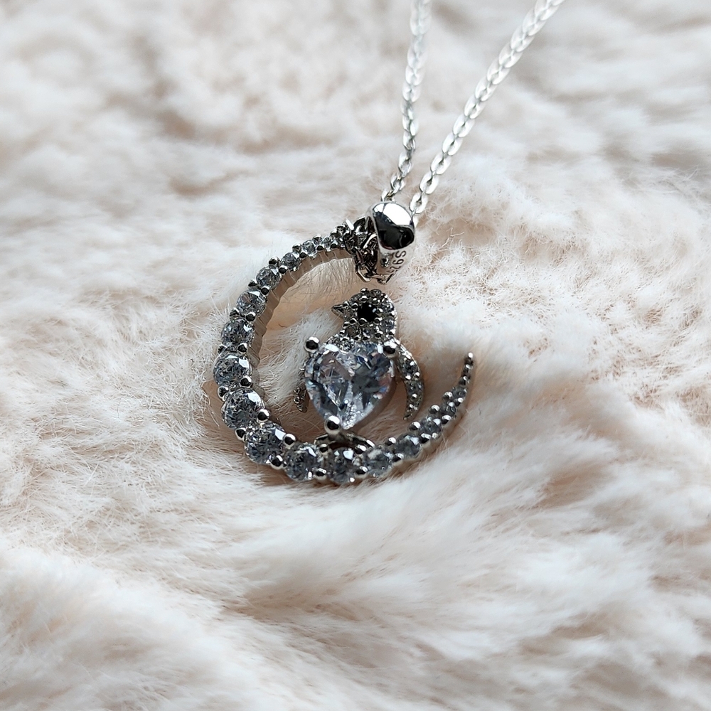 NWT - crescent moon penguin with heart shaped stone necklace
